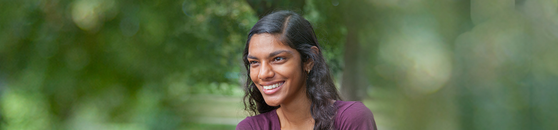  A outdoor headshot of an older Girl Scout  