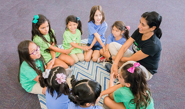Girl Scout troop in a friendship circle