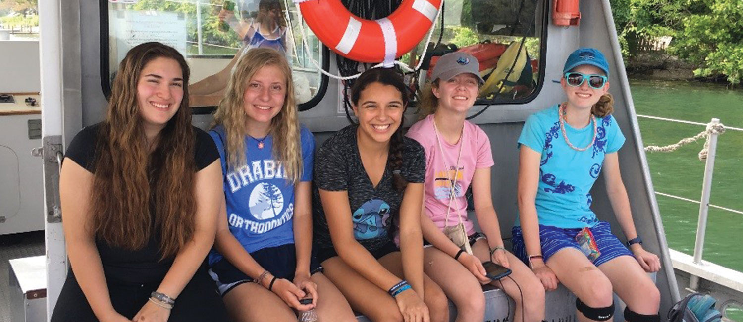  Girl Scouts Carmen, Theresa, Adriana, Erin and Charlotte island hop on Lake Erie—in-between catching fish for scientists to study and leading a beach clean-up—all in one day!  