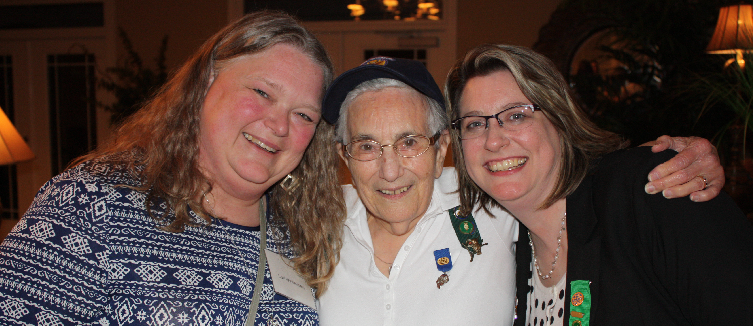  Girl Scout volunteer (Lori) with Lofi (center) and staff member Meredith (right) at a Girl Scouts North Carolina Coastal Pines event in 2016. 