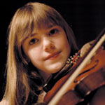 Photo of a girl playing the violin. &copy; GSUSA. All rights reserved. (Photographer: Quad Photo/Karineh Gurjian-Angelo/Dedjora Von Jutaz)