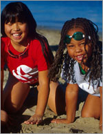 Photo of two younger Girl Scouts on the beach. &copy; GSUSA. All rights reserved. (Photographer: Lori Adamski-Peek)