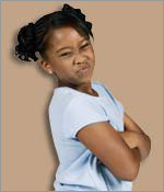 Photo of a girl with her arms crossed.