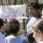 Photo of Dominique Dawes with a group of 8- to 14-year-olds.