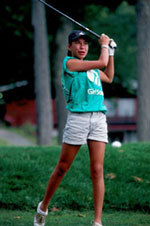 Photo of a Girl Scout playing golf.