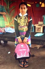 Photo of a girl showing off her Peace Pack.