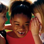 Photo of three young Girl Scouts. &copy; GSUSA. All rights reserved. (Photographer: Lori Adamski-Peek)