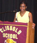 Photo of Jennifer standing at a podium.