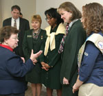 Photo of Senator Barbara Mikulski speaking with Jillian and other Girl Scout executives