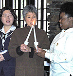 Photo of Teruko Wada (Japan), Debra Nakatomi, GSUSA's International Commissioner and Natisha Thomas, GSUSA Global Girl Scouting staff.