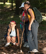 Photo of girls hiking with backpacks. © GSUSA. All rights reserved. (Photographer: Quad Photo/Karineh Gurjian-Angelo/Dedjora Von Jutaz)