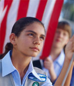 Photo of a Girl Scout flag ceremony. &copy; GSUSA. All rights reserved. (Photographer: Lori Adamski-Peek)