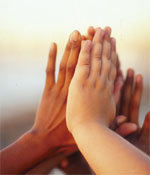Photo of hands clapping. &copy; GSUSA. All rights reserved. (Photographer: Quad Photo/Karineh Gurjian-Angelo/Dedjora Von Jutaz)