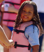 Photo of a Girl Scout wearing a lifejacket. &copy; GSUSA. All rights reserved. (Photographer: Lori Adamski-Peek)