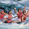 Photo of girls rafting in white water rapids.