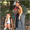 Photo of girls and leader hiking. © GSUSA. All rights reserved. (Photographer: Quad Photo/Karineh Gurjian-Angelo/Dedjora Von Jutaz)