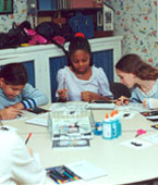 Photo of Girl Scouts participating in crafts activity. &copy; GSUSA. All rights reserved.