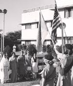Photo Girl Scouts holding flags in Pakistan, 1961. &copy; GSUSA. All rights reserved.