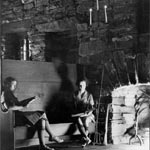 Photo of girls studying by the fireplace at Great Hall, circa 1940. © GSUSA. All rights reserved.