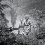 Photo of two women hiking on the Macy grounds, circa 1949-1958. © GSUSA. All rights reserved.