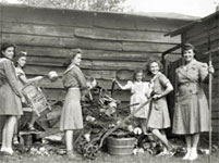 Photo of Girl Scouts collecting scrap metal. © GSUSA. All rights reserved.