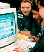 Photo of Girl Scouts surfing the Internet. &copy; GSUSA. All rights reserved.
