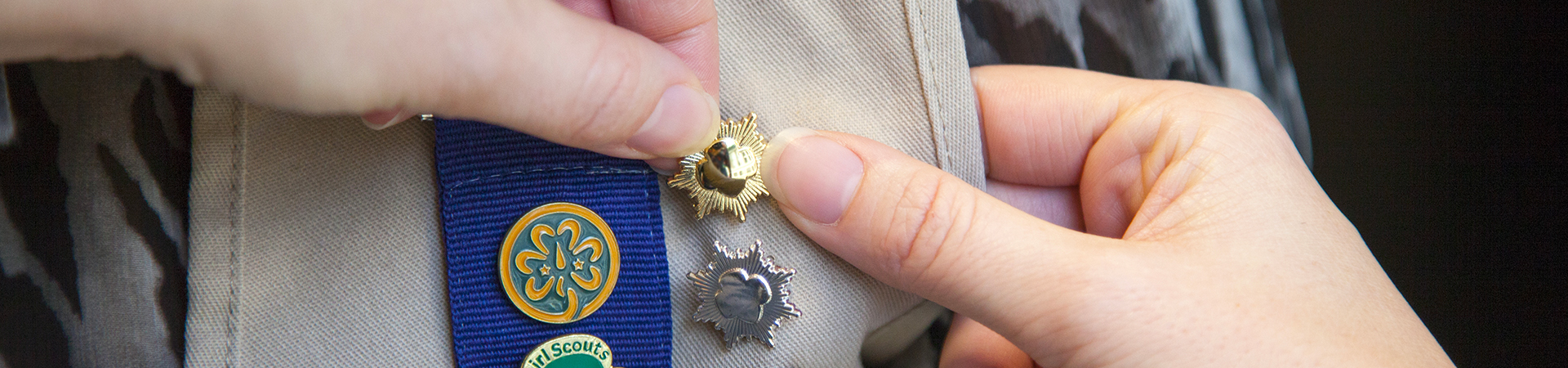  gold award pin on ambassador uniform vest 