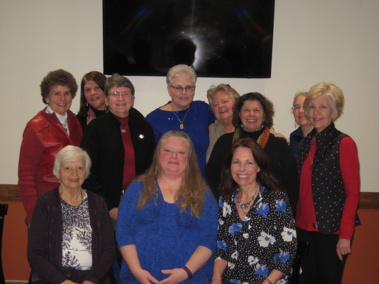 Lori and a group of Girl Scout sisters celebrate World Thinking Day together in 2016.