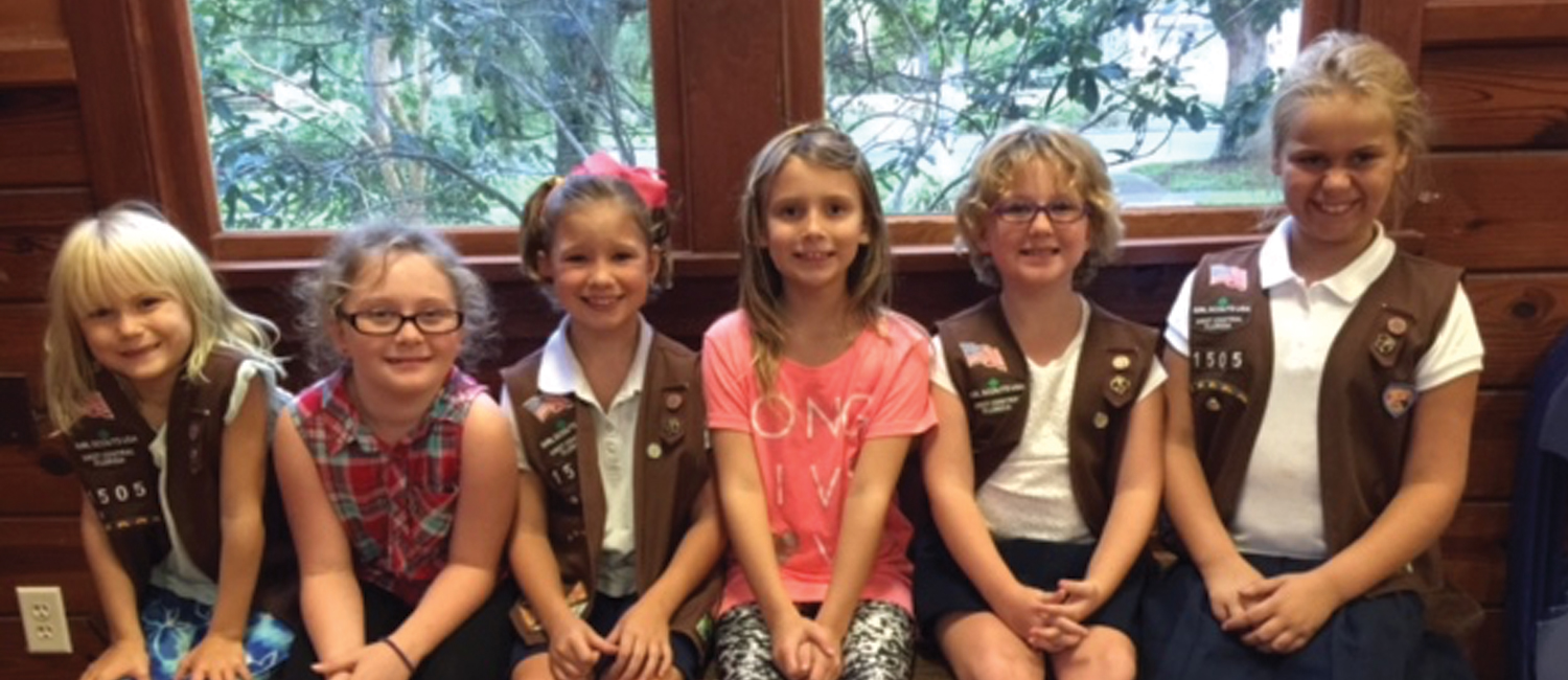  a troop of Brownie Girl Scouts 