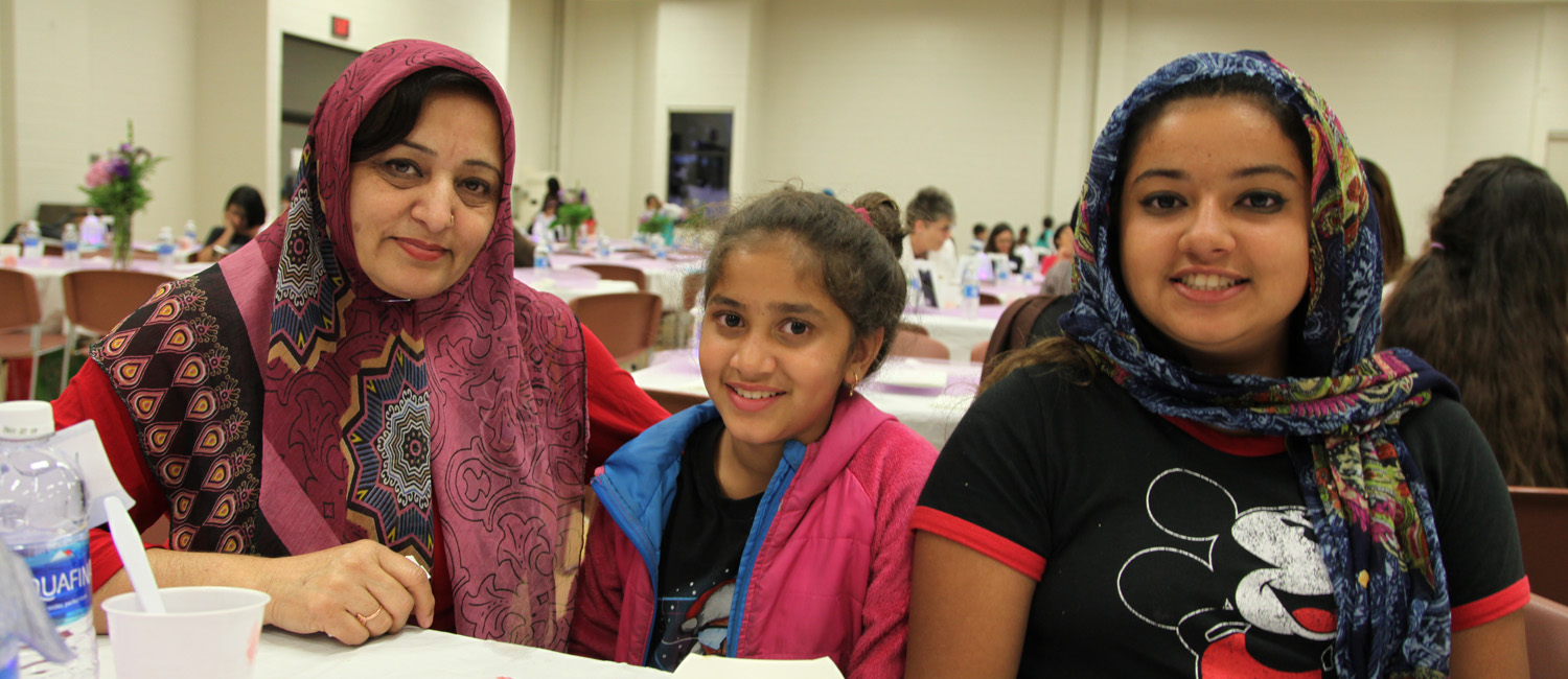Azra (left) with her daughters Eshal (center) and Rameesha.