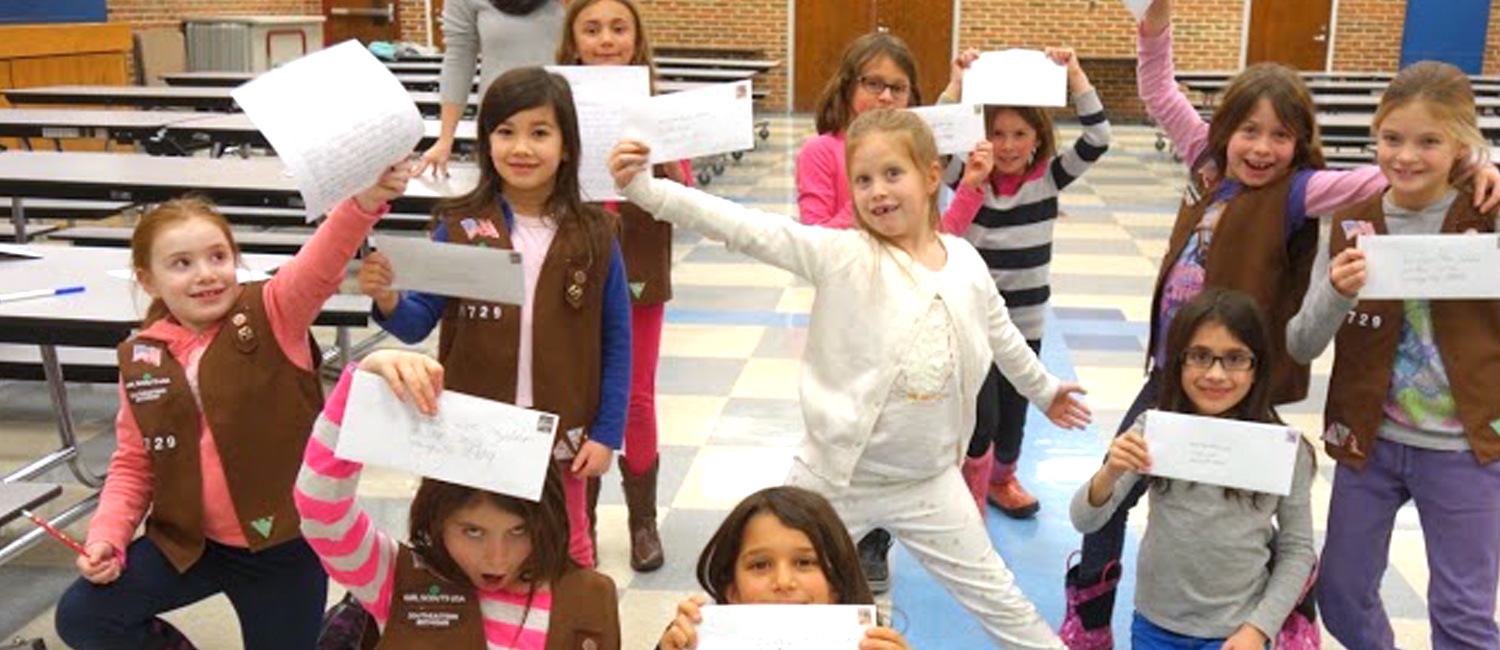   Girl Scout Brownies show off their advocacy letters to Michigan Governor Rick Snyder. 