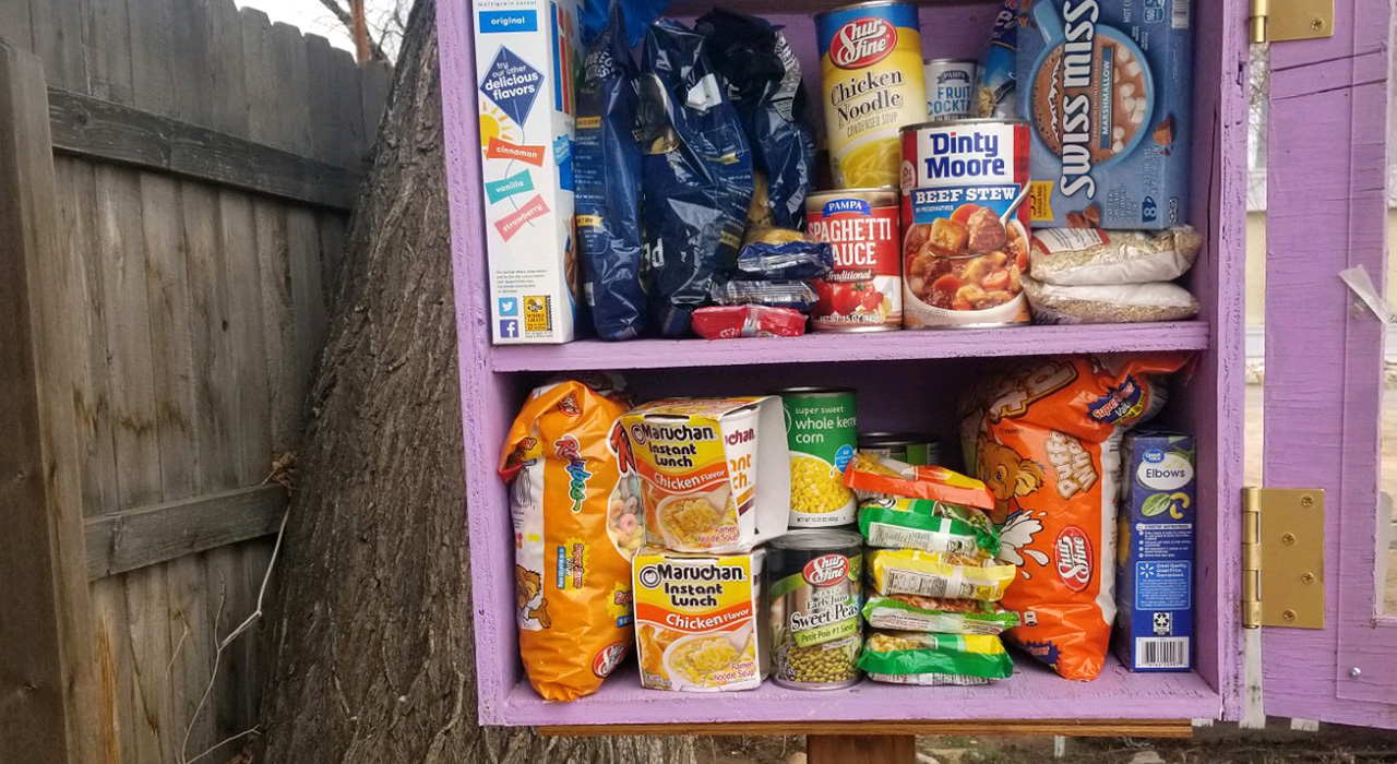  a little free pantry filled with non-perishable food 